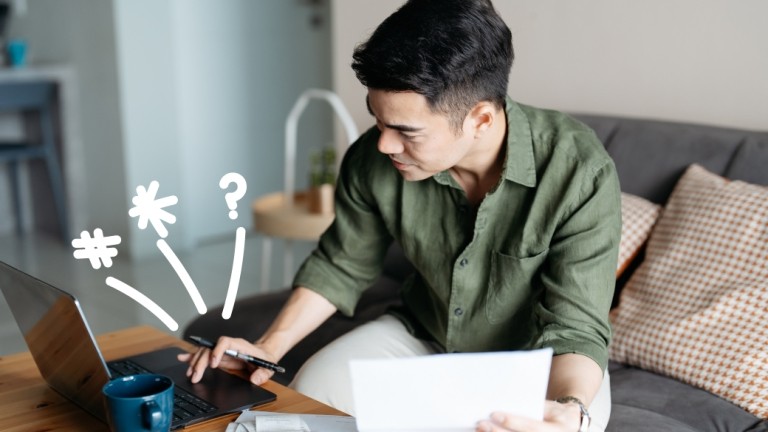 Man on his computer with doodles 