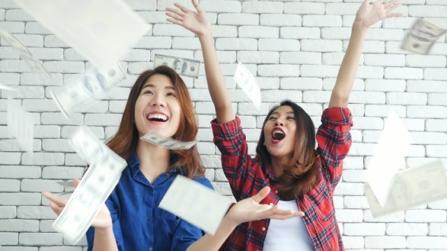Happy people with money
