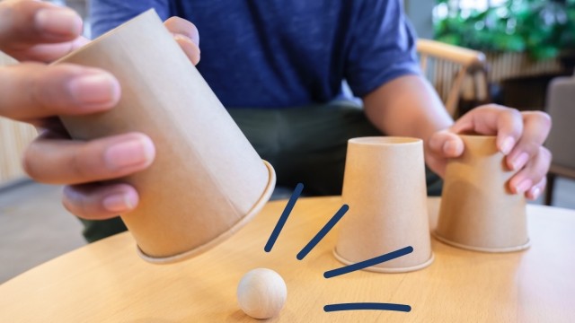 Game of find the ball with cups