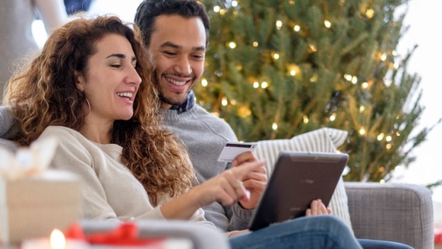 people sitting next to tree