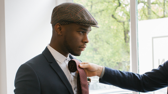 Young man in a boutique store