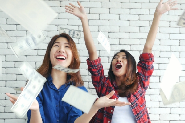 Happy people with money