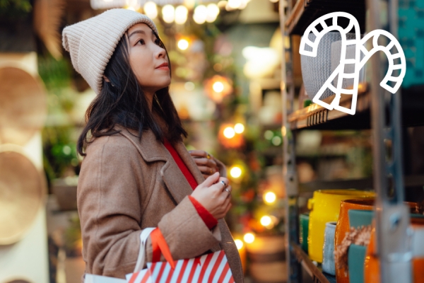 Woman shops for gifts during the holiday season