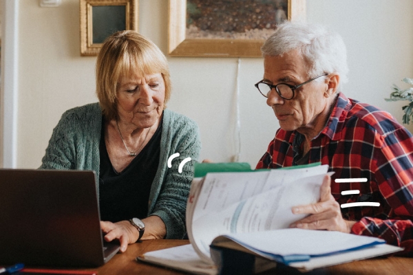 A couple looks over financial paperwork
