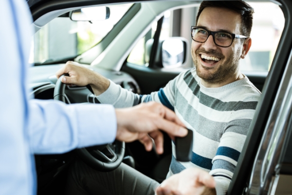 man in car